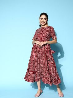 Maroon and white bandhani print fit and flare dressBoat neckShort, regular sleevesTie-up detailMidi length in flounce hem hemCotton fabric Bandhani Print, Bandhani Dress, Printed Gowns, Wrap Midi Dress, Coffee Brown, Printed Sarees, Blouse Piece, Fit And Flare Dress, Printed Skirts