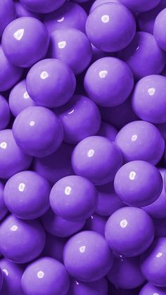 purple candy balls are shown close up