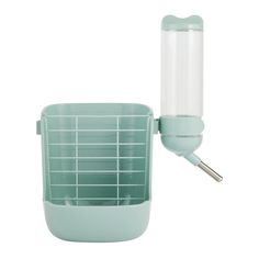 a green container with a white handle on the side and a light bulb attached to it