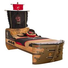 a pirate themed bed with an ironing board on the headboard and foot board