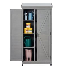 a gray storage cabinet with doors open and various items in the bottom shelf on wheels