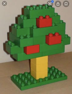 a lego christmas tree with red and green decorations