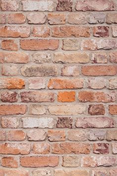 an old brick wall is shown in this image