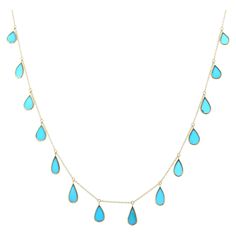 Handmade Turquoise Drop Fringe Necklace in 18K Gold studded with pear cut turquoise. This stunning piece of jewelry instantly elevates a casual look or dressy outfit. Sapphire stimulate concentration and reduces stress. Designed with pear cut turquoise set in solid gold bezel settings making a everyday necklace to make you stand out of the crowd. This is a perfect December Birthstone Necklace and Grandma Gift, Bridal Shower Gift, Mom Gift, Gift For Sister, Mother Daughter Gift, Bride To Be Gift, Diamond Charm Necklace, Gold Gemstone Necklace, December Birthstone Necklace, Dressy Outfit, Mother Daughter Gifts, American Modern, Fringe Necklace, Everyday Necklace, Grandma Gift