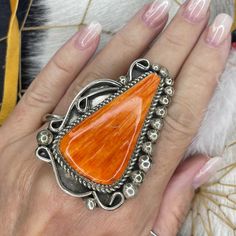 1/2 Price! NAVAJO Native American SPINY OYSTER Sterling Silver Size 9 Ring! Nice Chunk of Orange Spiny Oyster Shell! Handmade Navajo Ring! Start your Spiny Oyster collection today with this beautiful ring!  This ring is an unbelievable price...especially with the amount of Spiny Oyster on this ring!  I just LOVE the beautiful orange tones on this stone.  Pair with Navajo Pearls and your other Native American jewelry.  This ring weighs a whopping 36 grams! Please review all pictures and video bef Navajo Pearls, Navajo Rings, Orange Tones, Horse Jewelry, Native American Turquoise, Native Jewelry, Spiny Oyster, Jewelry Show, Vintage Navajo