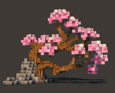 a tree made out of blocks with pink flowers