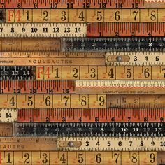 many different rulers are stacked together on top of each other, with the words measure written below them