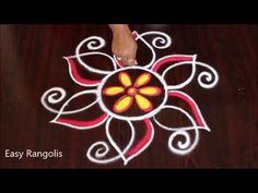 a woman standing on top of a wooden floor next to a flower painted on the ground