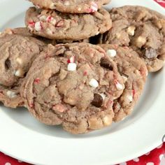 chocolate chip cookies with white and red sprinkles on a plate