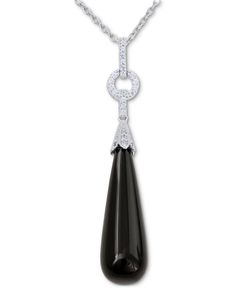 Dramatic black agate drops are suspended from a surmount encrusted with Swarovski zirconia pave to create this beautiful silver pendant necklace. Luxury Black Drop Jewelry, Elegant Black Necklace With Detachable Pendant, Elegant Black Teardrop Pendant Necklace, Elegant Onyx Drop Jewelry, Elegant Onyx Pendant Necklace, Elegant Black Drop Necklace, Elegant Black Jewelry With Detachable Pendant, Formal Black Teardrop Pendant Necklace, Elegant Sterling Silver Necklaces With Black Enamel