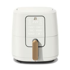 an image of a white and gold slow cooker on a white background with clippings