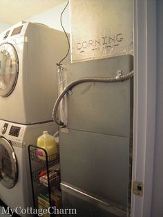 a washer and dryer sitting next to each other