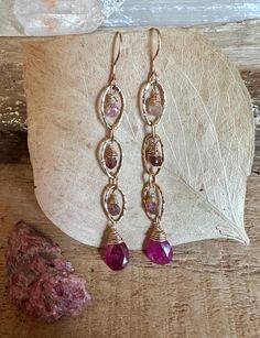 Gold filled dangle earrings with pink tourmaline gemstones Rose Gold Dangle Jewelry With Gemstone, Rose Gold Gemstone Dangle Jewelry, Pink Gold Drop Earrings, Pink Gemstone Jewelry For Jewelry Making, Fine Jewelry With Pink Gemstone Accents, Gold Long Drop Jewelry With Gemstone Accents, Fine Jewelry In Pink With Gemstone Accents, Pink Fine Jewelry With Natural Stones, Pink Bohemian Jewelry With Gemstones