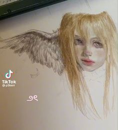 a drawing of an angel with long blonde hair