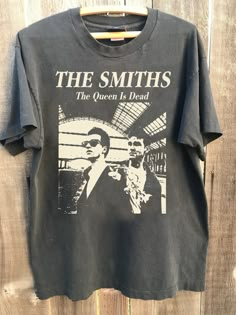 The Smiths Shirt, The queen is dead,There is A Light That never Goes Out , The Smiths music, The Smiths tee Gift for fans Comfort color ABOUT MATERIAL: Comfort Colors® 1717 Made with medium fabric (6.1 oz/yd² (206.8 g/m consiting of high quality, 100% ring-spun US cotton for long-lasting comfort. The relaxed fit keeps the wearer comfy in both casual and semi-formal settings while the crew neckline delivers that classic, neat style which makes it perfect for accessorizing. What's more, the pre-shrunk fabric ensures a consistently great fit. Made using 100% US cotton that is ethically grown and harvested. Gildan is also a proud member of the US Cotton Trust Protocol ensuring ethical and sustainable means of production. How to wash Comfort Color :Machine wash: cold (max 30C or 90F); Do not bl Cool Shirts Aesthetic, The Smiths Clothes, The Last Of Us Shirt, The Smiths Shirt Outfits, The Smiths Sweater, The Smiths Shirt Aesthetic, The Smiths Shirt, The Smiths Tshirt, The Smiths Band Tee