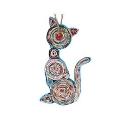 a cat ornament made out of rolled up paper and yarn on a white background