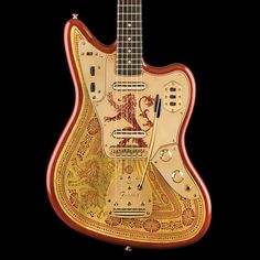 an intricately decorated guitar is shown against a black background