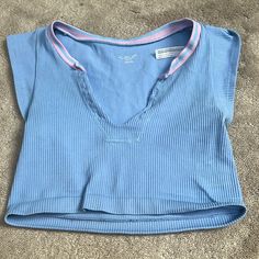 Never Worn Urban Outfitters Top Size Xs Cheap Cotton Crop Top From Urban Outfitters, Light Blue Cropped Casual Crop Top, Light Blue Casual Cropped Crop Top, Casual Light Blue Cropped Crop Top, Casual Blue V-neck Crop Top, Spring V-neck Light Blue Crop Top