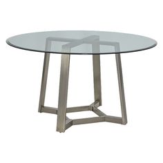 a round glass table with metal legs