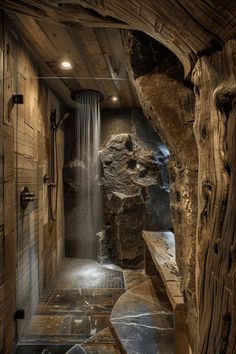 a very nice looking bathroom with a waterfall in the shower