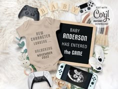 an image of baby clothes and video game controllers on the floor with text that reads, baby anderson has entered the game