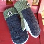 a pair of slippers sitting on top of a red table next to a book