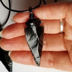 Black Obsidian Arrowhead protection necklace for men, women, unisex. ♥ See more of my arrowhead necklaces here: https://www.etsy.com/shop/UrbanMoonJewelry?search_query=arrow To see more sizes & larger sizes, check my inventory in my new store here.  https://www.etsy.com/shop/TerraWildCraft?search_query=obsidian 2.5 inch Obsidian Arrowhead Necklace: https://www.etsy.com/listing/1604295319/25-inch-black-obsidian-arrowhead 2.75 inch Obsidian Arrowhead Necklace: https://www.etsy.com/listing/15913223 Handmade Black Arrowhead Jewelry, Handmade Black Arrowhead Necklace, Arrow Pointing Down, Obsidian Arrowhead, Arrow Head, Arrowhead Necklace, Pendant For Men, Wire Wrapping Stones, Protection Necklace