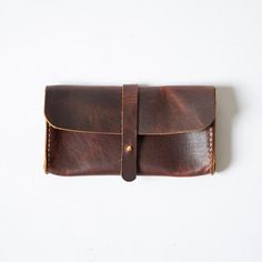 Classic Handmade Wallet For Everyday Use, Classic Handmade Travel Wallet, Leather Bifold Pouch With Card Slots, Classic Hand-stitched Wallets As Gifts, Leather Envelope Wallet With Interior Card Slots, Leather Hand-stitched Coin Purse For Everyday Use, Vintage Leather Clutch With Card Slots, Hand-stitched Rectangular Leather Coin Purse, Hand-stitched Leather Rectangular Coin Purse