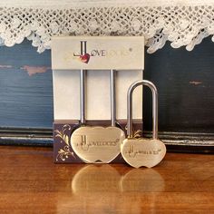 two heart shaped padlocks are on display