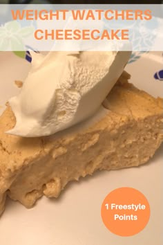 a piece of cheesecake with whipped cream on top and the words weight watchers cheesecake below