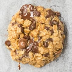 an oatmeal cookie with chocolate chips on top