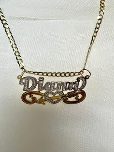 Beautifull 10k or 14k real solid gold name necklace, our name necklace is personalized and made to order. Cuban link chain is authentic 10k or 14k solid gold heavyweight only. *Cuban link chain weight approximately: 6-10 grams *Name charm size approximately: 1.5"x1/5"inches (7 LETTERS MAX) -How to order: Select: NAME CHARM ONLY OR WITH 3MM NECKLACE SIZE. *3mm necklace size available:14in,16in,18in,20in,22in,24inches. -Shipping:1-4 days -Labor: 1-5 days -Looking for a different design or characte Name Chain, Gold Name Necklace, Piercing Ideas, Cuban Link Chain, Necklace Size, Name Necklaces, Sims Mods, Cuban Link, Necklace Sizes