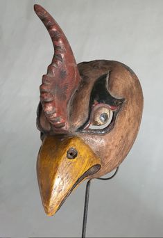 Old Javanese Chicken Mask  Indonesian masked dance predates Hindu-Buddhist influences. Native Indonesian tribes still perform traditional masked-dances to represent nature and communicate with their ancestral spirits.  Our collection of old hand carved wooden masks comes mostly from Java and Bali. Each piece is unique and between 30 to 75 years old. Most masks were carved out of a single solid piece of local hard wood and hand painted with natural colors. Dimension: 29cm x 28cm x 17cm Weight : 2 African Animal Mask, Traditional Masks And Prosthetics For Festivals, Traditional Masks And Prosthetics For Masquerade Festivals, Traditional Festival Masks And Prosthetics, Traditional Masks For Masquerade And Festivals, Indonesian Mask, Chicken Mask, Wooden Masks, Mask Dance