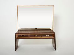 This rare and beautiful vanity designed by Paolo Buffa in Italy in the 1940s imparts a cozy, chic and glowing mood to a space. The warm rosewood remains looking beautiful and smooth eighty plus years later. Elegantly shaped, seating on two curved feet, this dressing console table features three drawers with sycamore wood framing and brass handles, and a large mirror with a sycamore frame. The piece feels delightfully modern for the Art Deco era, and charmingly vintage now. It is a very fine exam Dressing Console, Console Vanity, Brass Console, Beautiful Vanity, Sycamore Wood, Vanity Design, Furniture Vanity, Large Mirror, Vanity Table