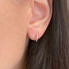 These Thin Diamond Huggie Earrings in 14k Gold are the perfect everyday staple. They are delicate, timeless, and have the right amount of sparkle. They are set with mini diamonds. Dress them up or down for any occasion! Diamonds (0.060 ct) 14k yellow, rose, or white gold Outside diameter: 10mm Width: 1mm Please allow up to 6 weeks for production.KAMARIA supports survivors of power-inequality violence through their 501(c)(3) nonprofit Restore Dignity. Everyday Diamond Earrings, Tiny Diamond Earrings, Diamonds Dress, Sparkle Hoop Earrings, Boulder Opal Necklace, Diamond Huggie Earrings, Gold Diamond Earrings Studs, Diamond Huggies, Western Earrings