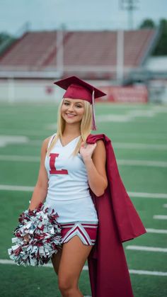 a woman dressed as a cheerleader holding a pom - pom in her hand