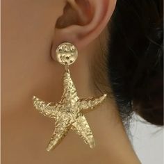 Gold Coated Woman’s Starfish Earrings Fun For The Beach , Something To Go With Your Beach Wear To Make It Look Outstanding A Great Set Of Gold Star Fish Can Do That I Only Have The One Pair So Grab Them While You Can . Nwot Elegant Star-shaped Summer Earrings, Gold Star Earrings For Summer, Elegant Starfish Earrings For Summer, Summer Earrings With Starfish Charm, Elegant Summer Starfish Charm Earrings, Star Shaped Earrings For Summer, Elegant Star-shaped Earrings For Summer, Elegant Summer Star-shaped Earrings, Star Shaped Summer Party Earrings