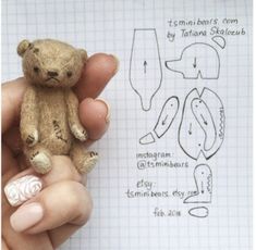 someone is holding a teddy bear in their left hand and sewing instructions on the right