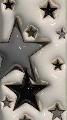 several black and white stars on a white background