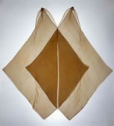 two folded brown paper squares on top of each other