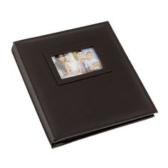 a black leather album with an image of two people