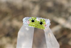 -Super cute, handmade, beaded frog ring 💚🐸 -Made out of crystal string and high quality, glass beads -It is a perfect friendship ring or a gift -Made to order in your choice size! -The offer concerns a single item, you can find more color options on my other listings SHIPPING This item is made to order and will be shipped in 3-6 days. DELIVERY TIME Sweden: 1-3 business days Europe, Europe non-EU: 3-6 business days United States, Canada: 5-8 business days Australia: 7-9 business days Mexico: 9- Transparent Frog, Beaded Frog, Frog Ring, Friendship Ring, Friendship Rings, Rings Statement, Halloween Shopping, Statement Rings, Color Options