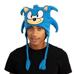 Embrace the world of Sonic the Hedgehog with this officially licensed Sonic Cosplay Laplander Beanie. Designed for fans of all ages, this beanie captures the spirit of Sonic's character with a big face design that includes 3D quills crafted from cut fabric and flat embroidery. Whether you're a dedicated cosplayer or simply want to showcase your Sonic fandom, this beanie is the perfect accessory. Made from high-quality acrylic yarn, it provides both warmth and comfort, making it suitable for cold Blue Novelty Costume Accessories For Cosplay, Novelty Beanie For Cosplay, Novelty Beanie Hat For Cosplay, Sonic Cosplay, Big Face, Face Design, The Hedgehog, Acrylic Yarn, Sonic The Hedgehog