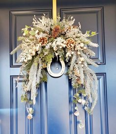 a wreath is hanging on the front door