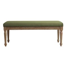 a wooden bench with a green cushion on the top and legs, against a white background