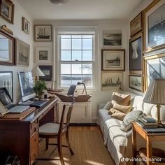 a living room filled with furniture and lots of pictures on the wall next to a window