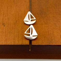 Cute and detailed 925 sterling silver sailboat earrings. Small and wearable but beautifully detailed. Sterling Silver Starfish Earrings With Charm, Adjustable Nautical Silver Jewelry, Sailboat Earrings, Nautical Sterling Silver Necklace Gift, Turtle Ring, Silver Anchor-shaped Nautical Jewelry, Turtle Pendant, Ring Photos, Geometric Earrings