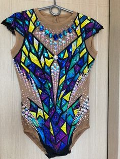 a bodysuit that has been made to look like an abstract piece of art on a door