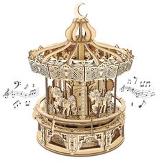 a wooden carousel with musical notes surrounding it