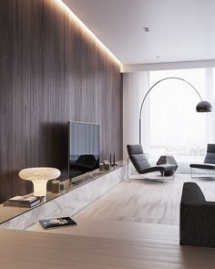 a modern living room with wood paneling and white furniture, including a large flat screen tv